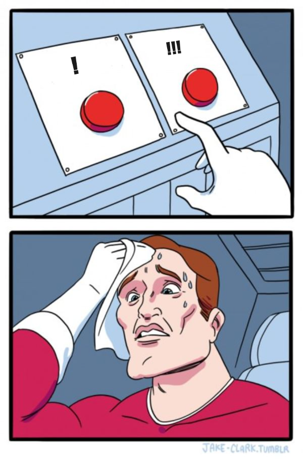 Two red buttons on a desk